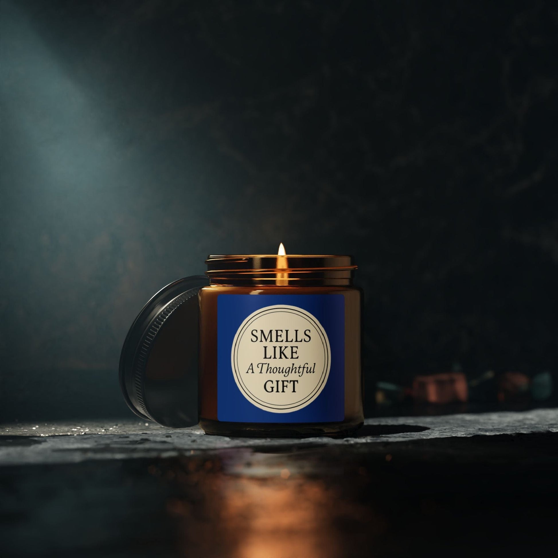 Printify Home Decor “Smells Like a Thoughtful Gift” 4oz Soy Candle – Amber Jar, Hand-Poured Elegance - Blue
