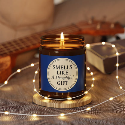 Printify Home Decor “Smells Like a Thoughtful Gift” 4oz Soy Candle – Amber Jar, Hand-Poured Elegance - Blue