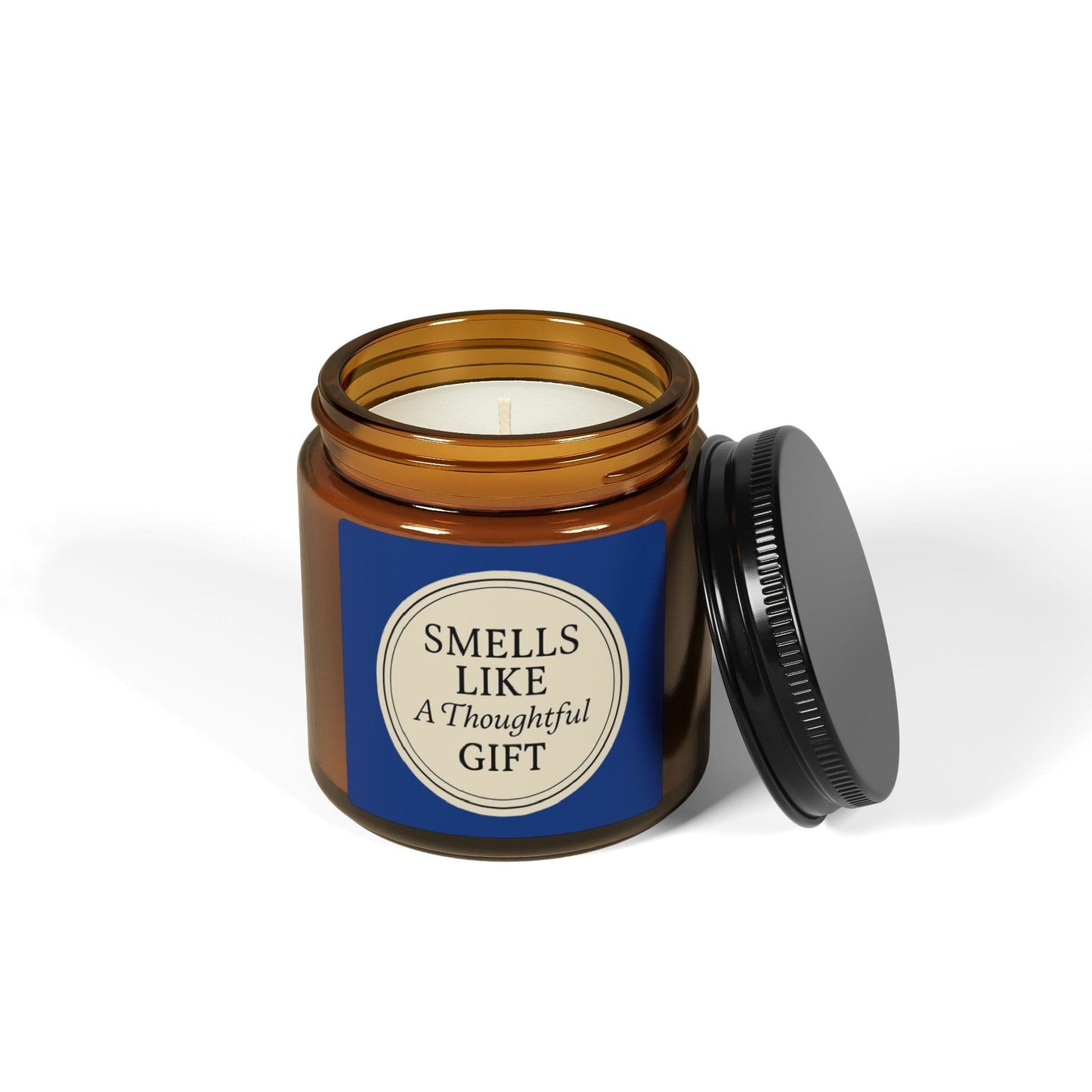 Printify Home Decor “Smells Like a Thoughtful Gift” 4oz Soy Candle – Amber Jar, Hand-Poured Elegance - Blue